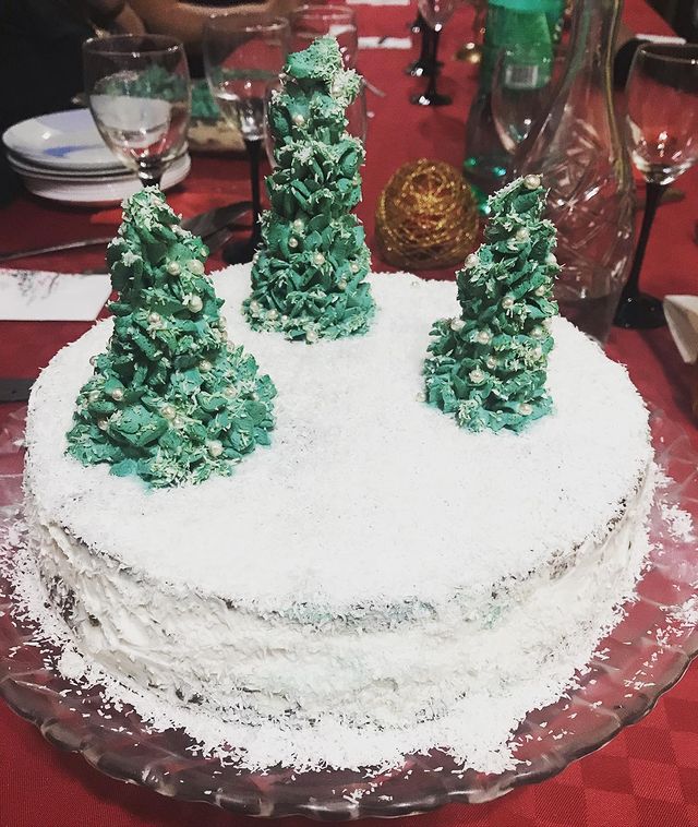 White Christmas cake with Christmas trees