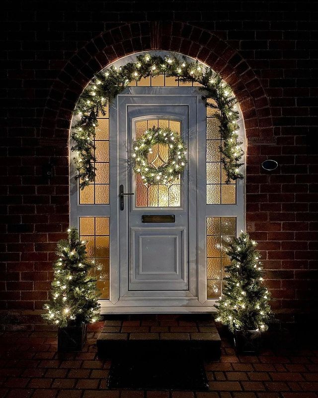 Christmas door with garlands