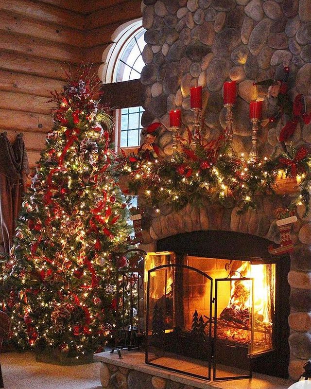 Beautiful fireplace with Christmas tree