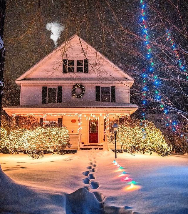 Christmas house with smoking chimney