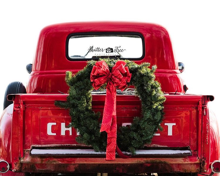 Red car with a wreath